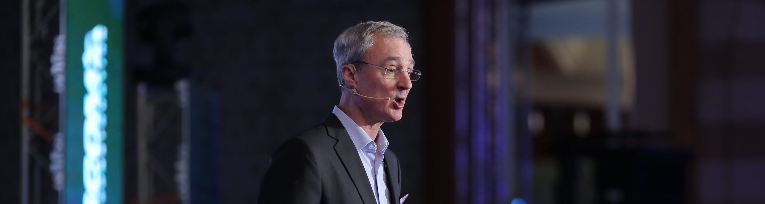 Mark DeVolder speaking on stage